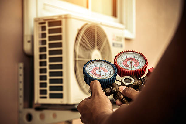 Professional Ac Installation technician working in Russellville, AL